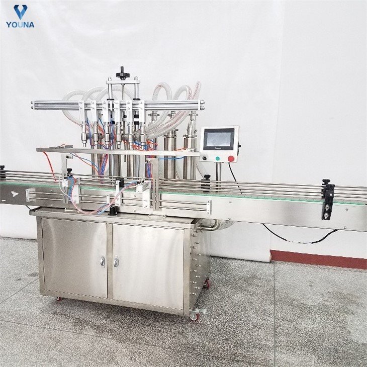 automatic 4 nozzle bottle filling machine (3)